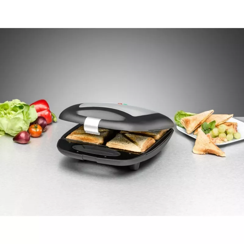 Máquina de sanduíches Rommelsbacher ST 1410 — 4 sanduíches, 1400 W, placas antiaderentes, preto/prateado