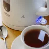 Chaleira elétrica Adler AD 1379w — 1,7 L, até 2200 W, branca, base 360°, polipropileno
