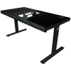 Secretária gaming de altura ajustável com motor duplo, função sentado/em pé, caixa de PC integrada, carregador sem fios, iluminação RGB, painel de controlo e portas USB, tampo em vidro temperado, preto.