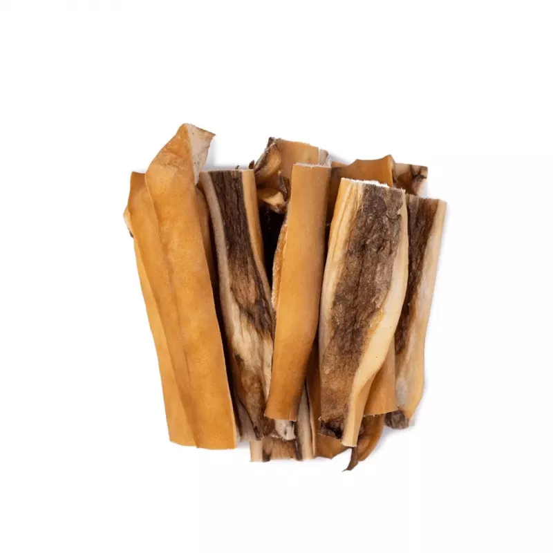 Petiscos para cães UNISZKI pele de vaca 100 g — tiras naturais de pele de vaca para higiene dentária, saqueta de 100 g, proteína 65%
