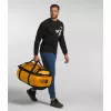 Saco de viagem The North Face Base Camp Duffel L 95 L poliéster preto, amarelo