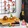 Backpack Buddies conjunto de porta-chaves Paladone Super Mario CDU com 24 peças – várias personagens, acessório de coleção