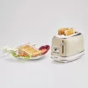 Torradeira Ariete 155 Design de 2 fatias com cestos para sanduíches, 6 níveis de tostagem, 810 W, caixa em aço inoxidável, gaveta de migalhas removível, bege pastel