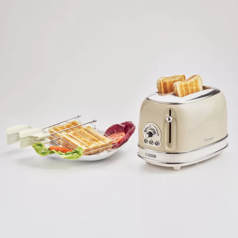 Torradeira Ariete 155 Design de 2 fatias com cestos para sanduíches, 6 níveis de tostagem, 810 W, caixa em aço inoxidável, gaveta de migalhas removível, bege pastel