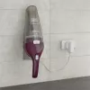 Aspirador de mão Black & Decker NVC115W cinzento, lilás sem saco