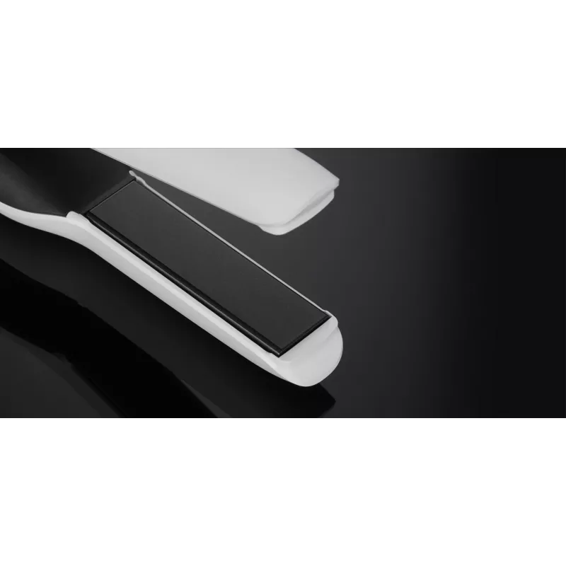 Ferro de alisar GHD Unplugged Warm White iões de lítio 300g