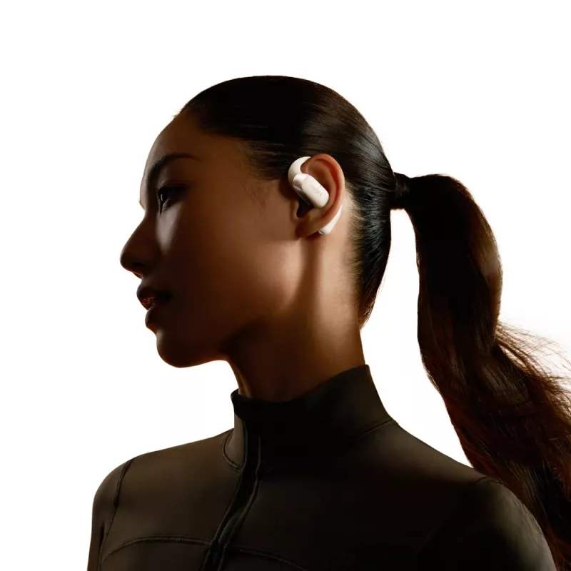 Headset sem fios open-ear Shokz OpenFit 2 — Bluetooth 5.4, IP55, condução óssea, 11 h de reprodução (48 h com estojo), USB‑C, bege