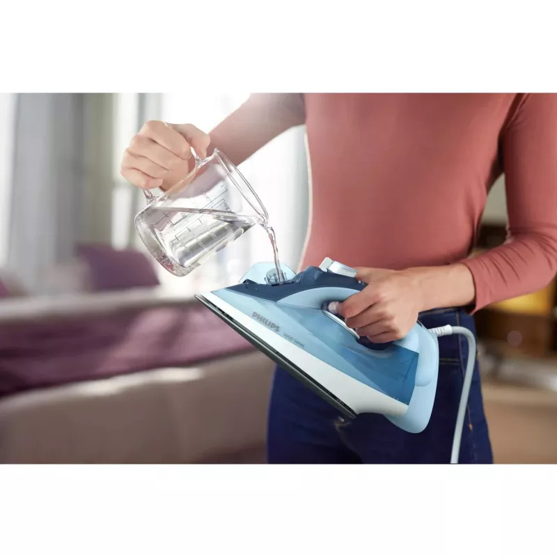 Ferro de engomar a vapor Philips DST5030/20 — 2400W, depósito 0,32 L, base SteamGlide Plus, 45 g/min vapor contínuo, 180 g/min golpe de vapor, azul