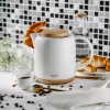 Chaleira elétrica Adler AD 1304 — 1 L, 1200 W, corpo em cerâmica, tampa articulada, base rotativa 360°, branca