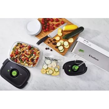Máquina de vácuo FoodSaver VS0100X — botão rotativo, inclui rolo de filme e 4 sacos de vácuo, prateado-branco