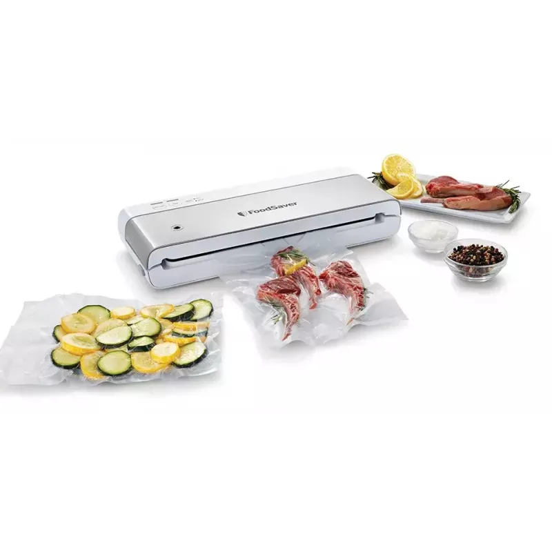 Máquina de vácuo FoodSaver VS0100X — botão rotativo, inclui rolo de filme e 4 sacos de vácuo, prateado-branco