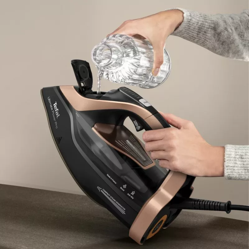 Ferro de engomar a seco e a vapor Tefal Ultimate Power Pro FV9E50 base Durilium AirGlide Autoclean 3200 W preto, cobre