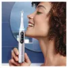 Escova de dentes elétrica Oral-B iO 9 adultos rotativa, 2 cabos, 2 cabeças de escova, bateria integrada, 3 h de carregamento, preto/rosa