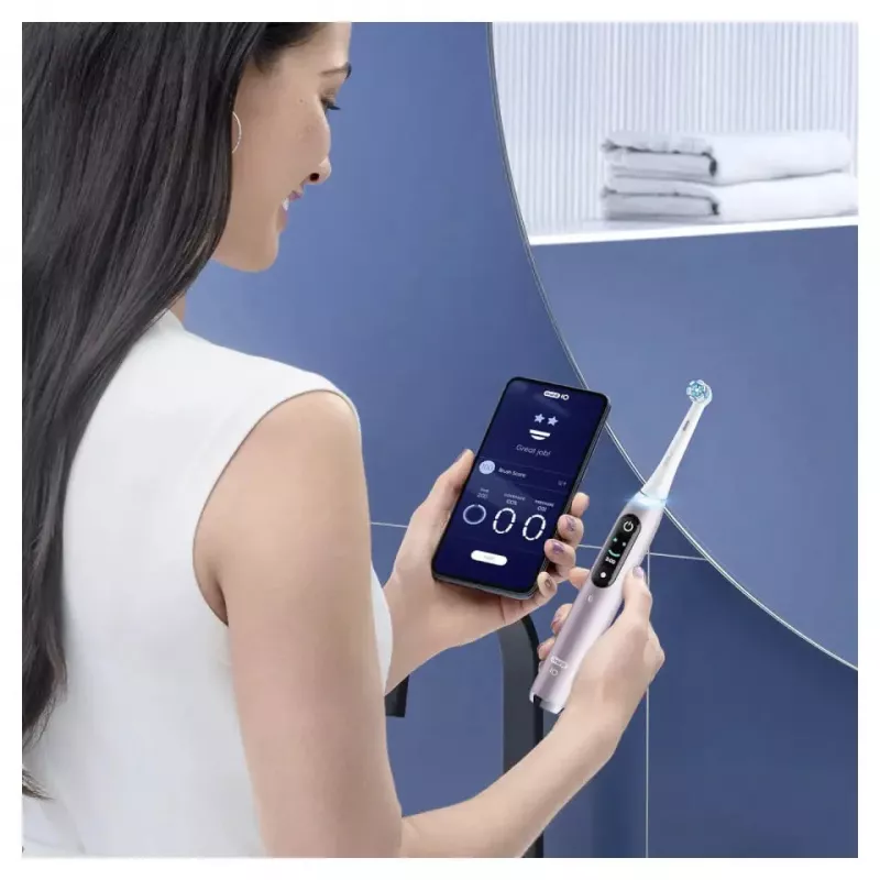 Escova de dentes elétrica Oral-B iO 9 adultos rotativa, 2 cabos, 2 cabeças de escova, bateria integrada, 3 h de carregamento, preto/rosa