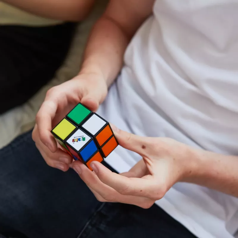 Rubik's Mini 2x2, puzzle clássico de combinação de cores 2x2, formato de bolso, brinquedo desafiante, a embalagem pode variar
