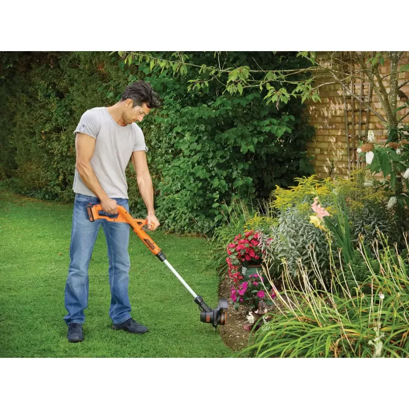 Black & Decker ST182320-QW aparador de relva a bateria, 18 V, 2,0 Ah Li-Ion, largura de corte de 25 cm, com bateria e carregador, laranja/preto