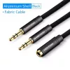 Cabo adaptador de áudio Vention 2× ficha 3,5 mm para conector fêmea 3,5 mm de 4 polos, 0,3 m, preto