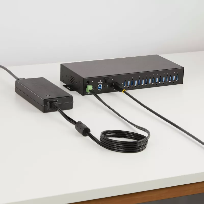 StarTech.com Hub USB industrial 5Gbps de 16 portas com fonte de alimentação, caixa metálica, montável, proteção ESD, alimentação por blocos de terminais, função de carregamento USB, comutador dual-host – TAA