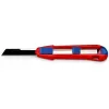 Faca de lâminas retráteis Knipex CutiX® preto azul vermelho