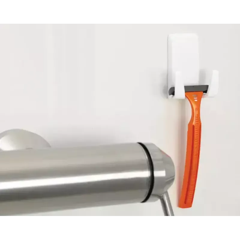 Suporte para máquina de barbear Tesa Powerstrips Waterproof Wave, suporte autoadesivo para casa de banho, design à prova de água, branco