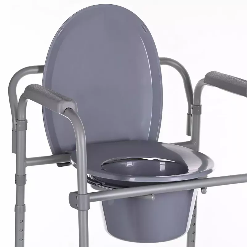Cadeira sanitária dobrável ANTAR com braços, caixa de armazenamento, estrutura em aço, altura ajustável 35–50 cm, carga máx. 120 kg, cinzento
