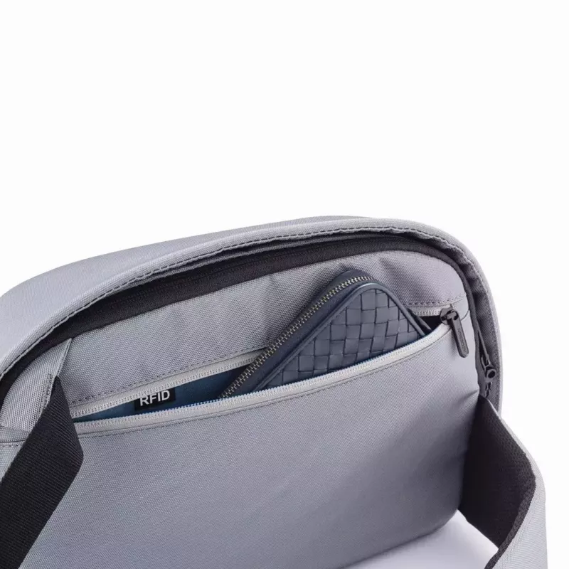 Mochila antifurto XDDESIGN Bobby Sling cinzenta — leve, repelente à água, transportável como bolsa de ombro