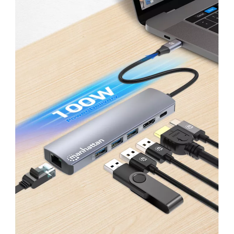 Dock/Hub USB-C Manhattan, ligações (x6): Ethernet, HDMI, USB-A (x3) e USB-C, com Power Delivery (PD) 100W – requer carregador USB-C externo (não incluído). Alimentado por USB (sem fonte de alimentação externa necessária), quando o PD não é utilizado
