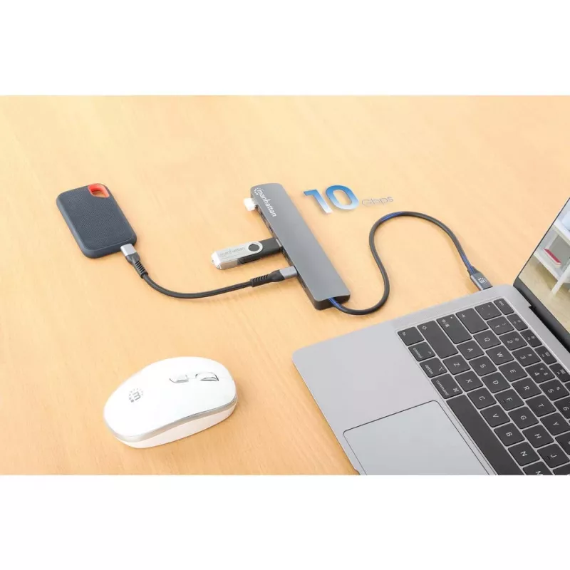 Dock/hub USB-C Manhattan, portas (x7): USB-A (x3) e USB-C (x4), com Power Delivery (PD) 100 W – requer carregador USB-C externo (não incluído). Alimentado por USB (não requer fonte de alimentação externa) quando não é usado PD, alumínio