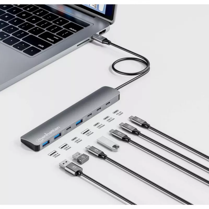 Dock/hub USB-C Manhattan, portas (x7): USB-A (x3) e USB-C (x4), com Power Delivery (PD) 100 W – requer carregador USB-C externo (não incluído). Alimentado por USB (não requer fonte de alimentação externa) quando não é usado PD, alumínio