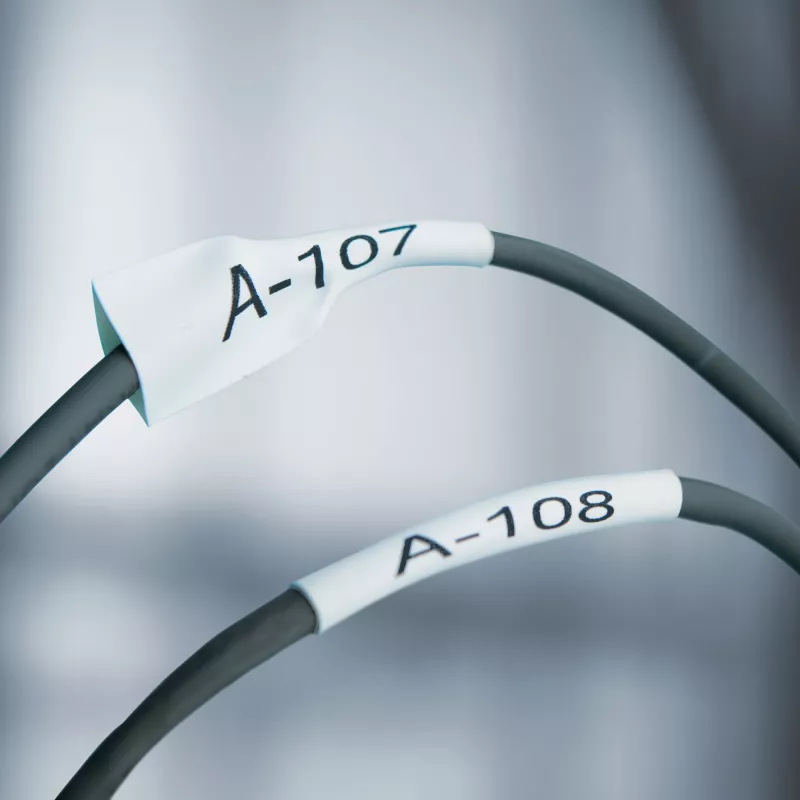 Tubos de etiquetas DYMO Rhino Industrial Heat-Shrink para cabos | 6 mm x 1,5 m | Impressão preta sobre branco | para etiquetadoras Rhino