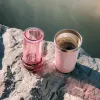 Cafeteira AeroPress Go Plus com copo térmico rosa 475 ml