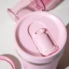Cafeteira AeroPress Go Plus com copo térmico rosa 475 ml