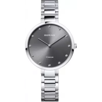 BERING relógio de senhora de quartzo Classic Collection 34mm mostrador azul Sunray bracelete de malha milanesa prateada 11334-772